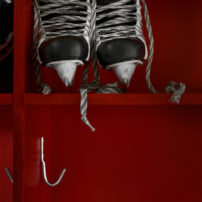 Pair of hockey skates on the shelf in a locker room.  Copy space.Click on an
